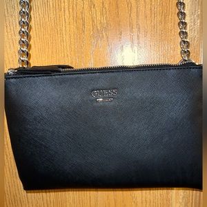 Black Guess crossbody purse with silver chain detailing